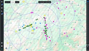 Measurement devices (yellow crosses), estimated location points of measured signals (dots – colour palette depends on frequency) and identified targets